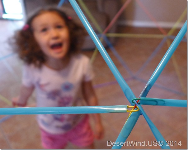 Paper clip connectors fit into straw perfectly. Mostly. Cute child in background bonus.